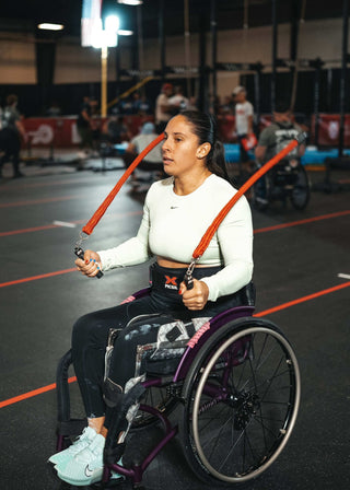 Amalia in a wheelchair using the Equip Products Multi Ropes™ at the 2023 WheelWOD Games