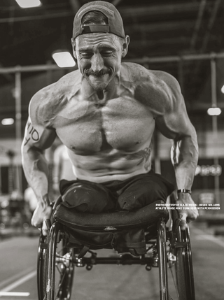 Mike Egan US Marine and Adaptive Athlete in a wheelchair during a competition fully pumped