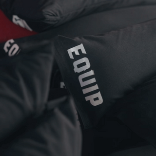 CrossCarry Sandbags stacked waiting to be picked up by athletes at a competition