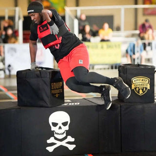 Steven Walker Jumping over the Equip Products Coffin holding the Equip Package