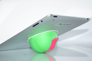 Green iSucker on iPad using as a stand
