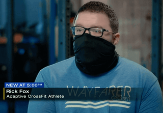 Picture of Rick Fox, adaptive wheelchair athlete and Quad competitor in a mask.