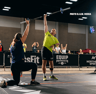 Male with Brachial Plexus Lifting Barbell