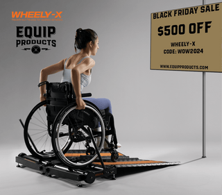 Lady on Wheely-X Looking at a monitor that states BLACK FRIDAY SALE $500 OFF Wheely-X