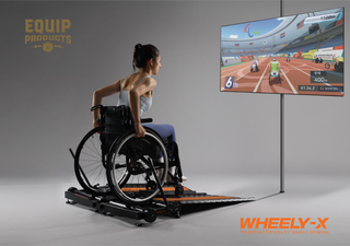 Lady in wheelchair using the Wheely-X available from Equip Products