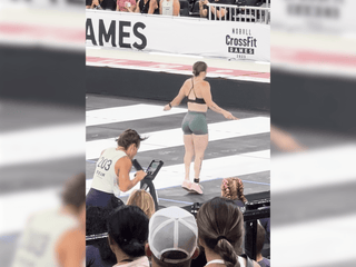 A Young women competing at the 2023 CrossFit Games jumping rope