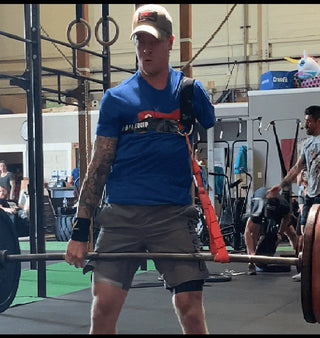 Logan Aldridge using the Aldridge Arm Lifting Harness.