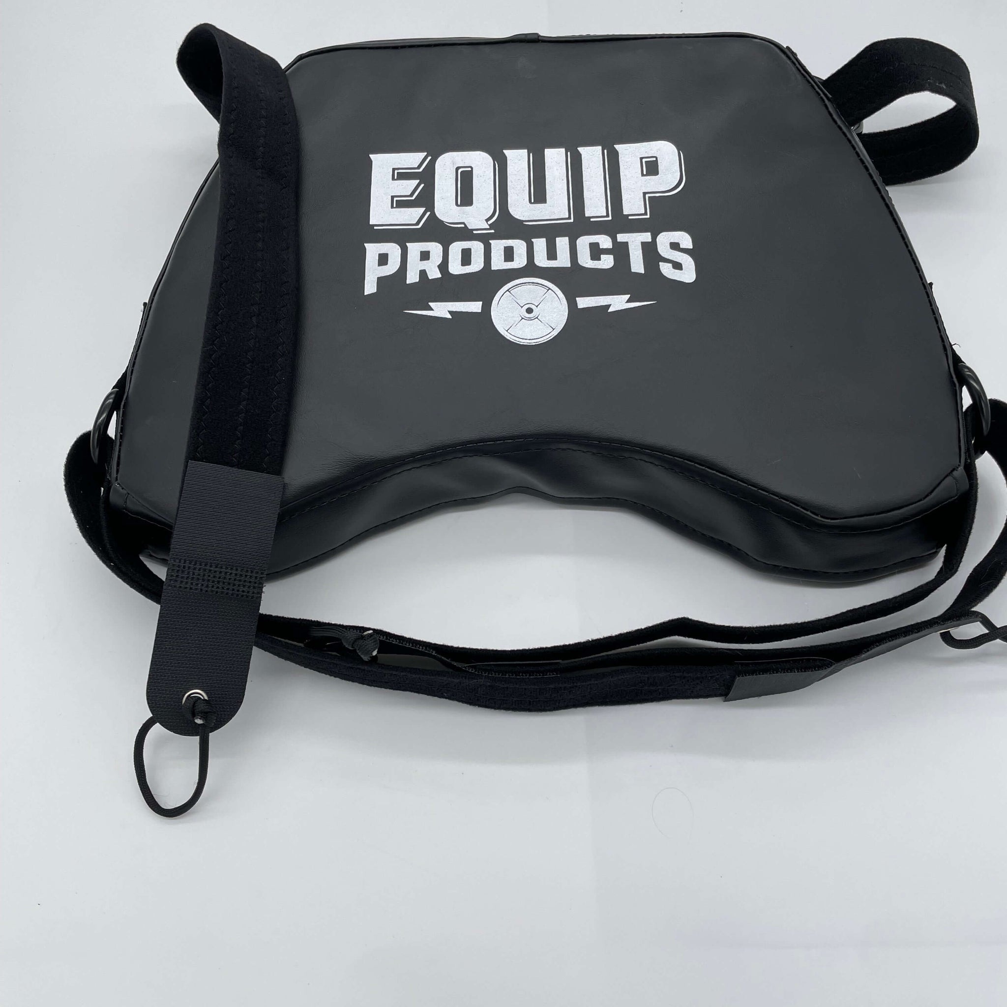 a LapMat with the Quad straps on it on a white background.