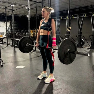 Woman Lifting barbell with Aldridge Arm after Wrist Replacement Surgery
