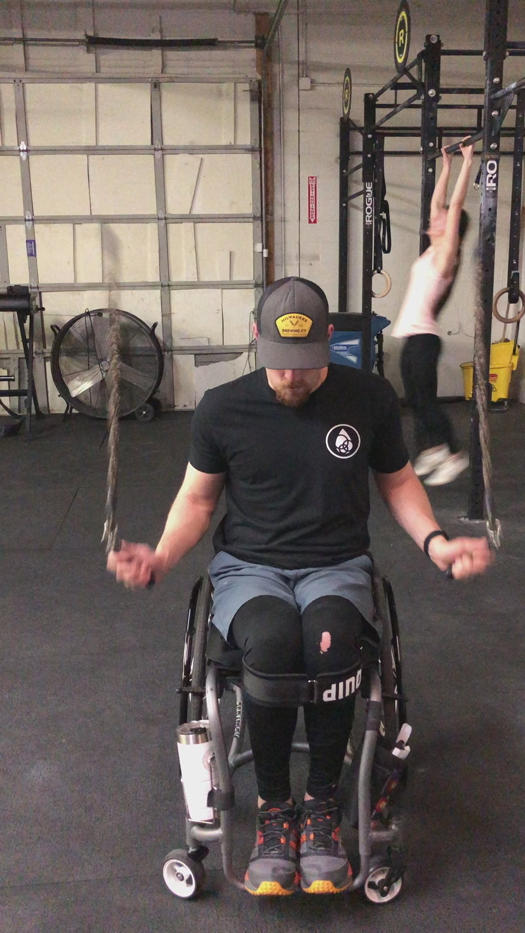 MALE IN WHEELCHAIR USING TWISTED MULTI ROPES