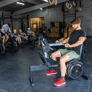 Strength Erg with man using it in a gym