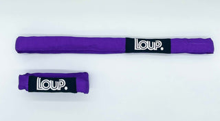 LouP Strap laying straight on a white background.