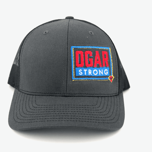 Trucker hat in black mesh - black front panel with the Ogar Strong Logo embroidered on the front left panel