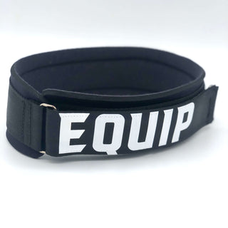 Angled slightly to the left Large Leg Strap black with white lettering that reads Equip, on a white background.