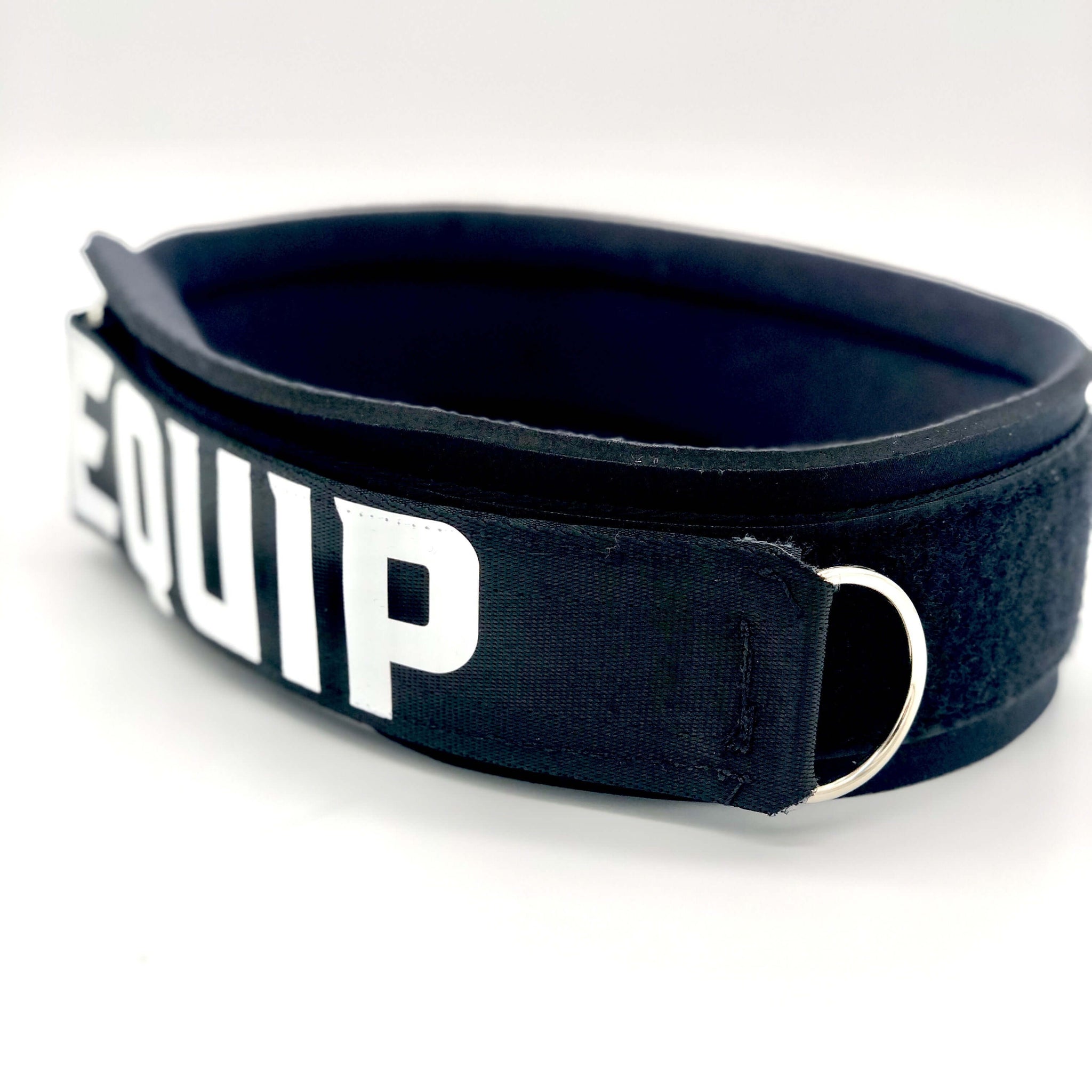 Angled slightly to the right showing D-Ring Large Leg Strap black with white lettering that reads Equip, on a white background.