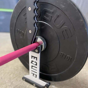 Bar Jack Holding a Pink Barbell with Black Bumper Plates