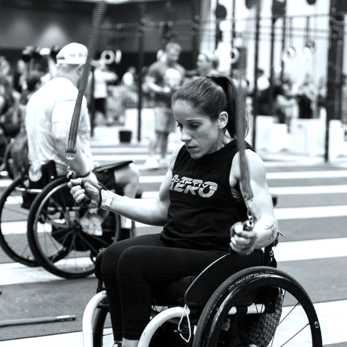 Lady in a wheelchair using Multi Ropes™ (Jump Ropes For Seated Athletes.)