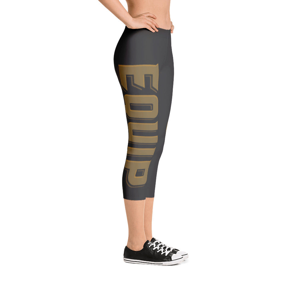 Capri Leggings With Equip Products Down one leg and the bumper plate Equip Logo on the other leg facing right